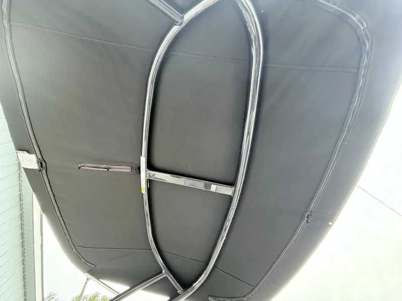 Slide: The Image of Monterey M-20 2020 boat canopy with black fabric cover. - 17