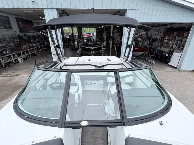 Slide: The Image of 2020 Monterey M-20 boat in a workshop setting. - 20