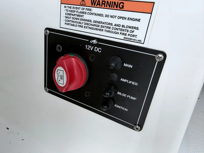 Slide: The Image of Monterey M-20 2020 boat control panel with warning label and switches. - 23