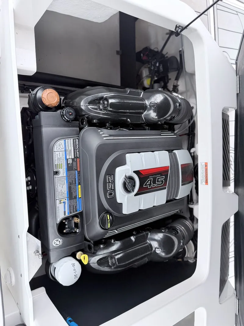 Slide: The Image of Engine compartment of a 2020 Monterey M-20 boat with 4.5L engine. - 24