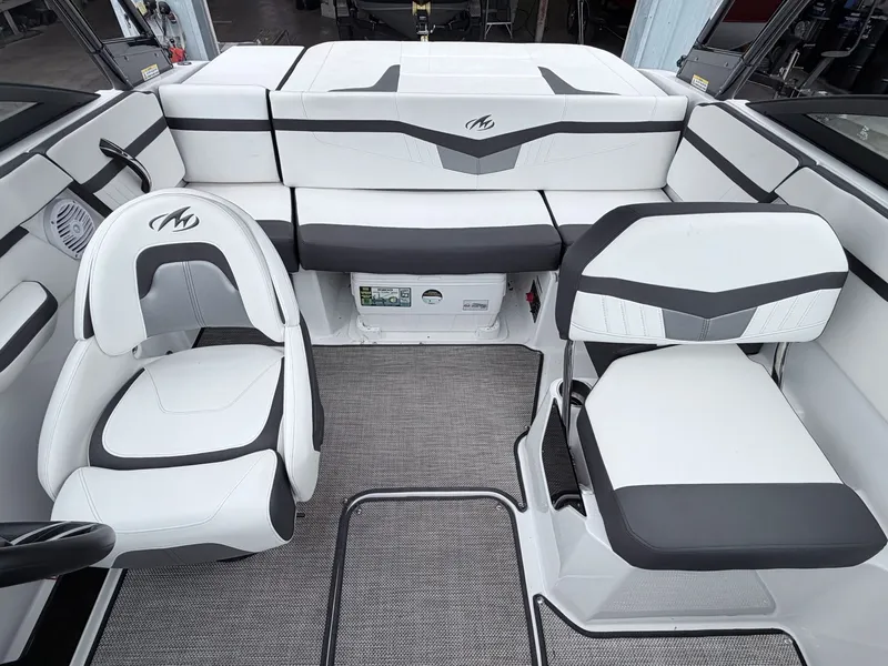 Slide: The Image of Interior of a 2020 Monterey M-20 boat with white seating. - 25
