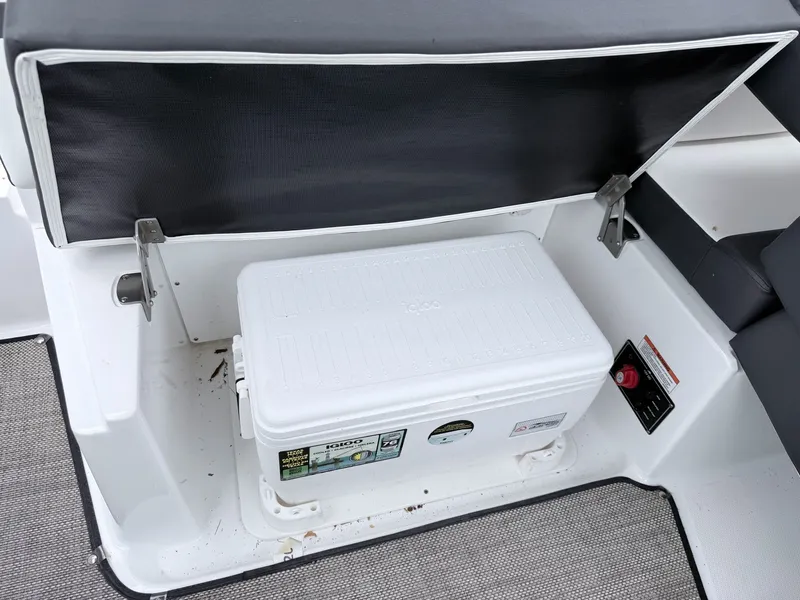 Slide: The Image of Monterey M-20 boat with Igloo cooler in storage compartment, year 2020. - 3