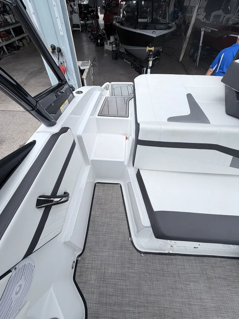 Slide: The Image of Interior of a 2020 Monterey M-20 boat, featuring modern seating and flooring. - 4