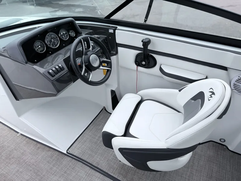 Slide: The Image of Interior of 2020 Monterey M-20 boat, featuring steering console and seat. - 44
