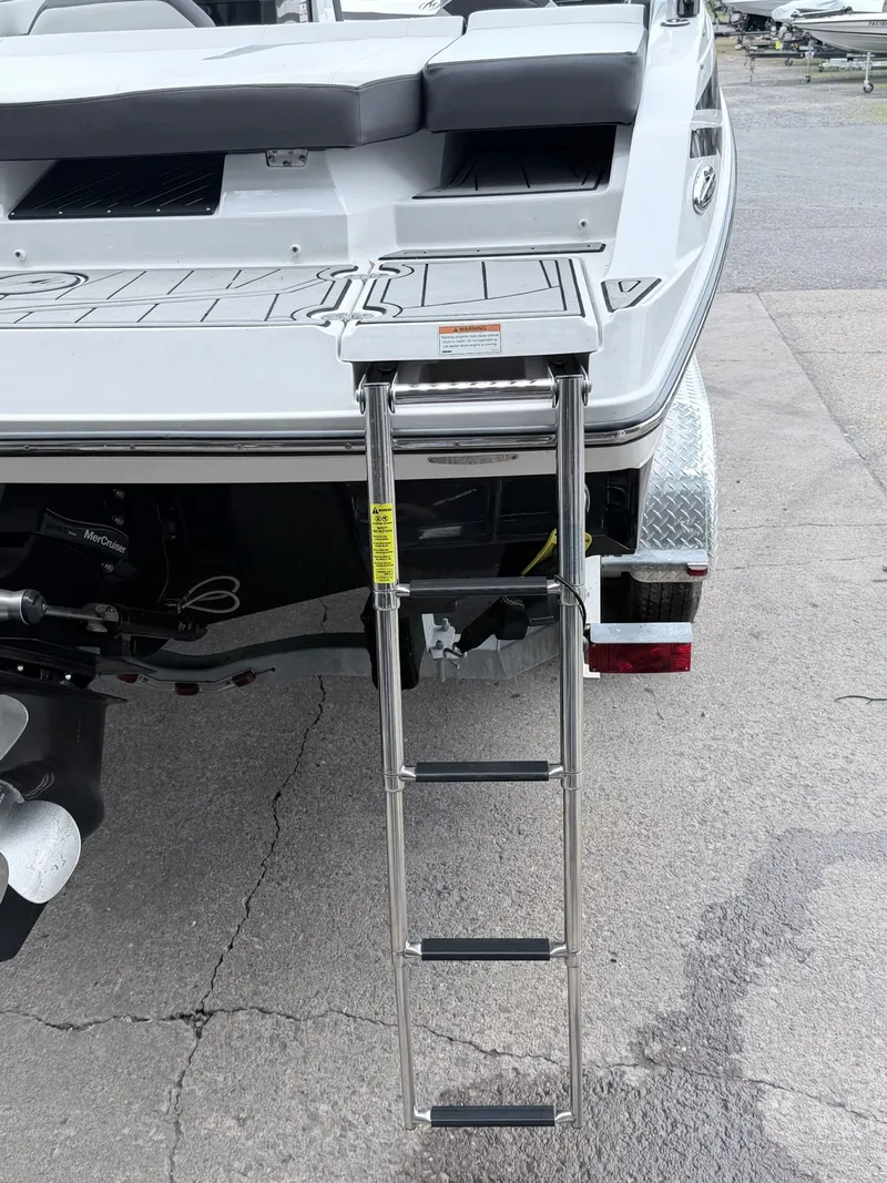 Slide: The Image of 2020 Monterey M-20 boat with retractable swim ladder. - 49