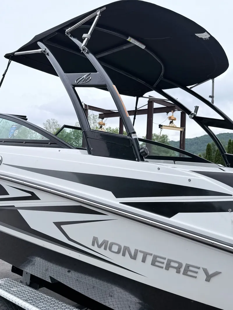 Slide: The Image of 2020 Monterey M-20 boat featuring sleek design. - 6