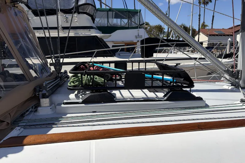 Slide: The Image of Deck of 2010 Beneteau Oceanis 37 sailboat with ropes and equipment. - 14