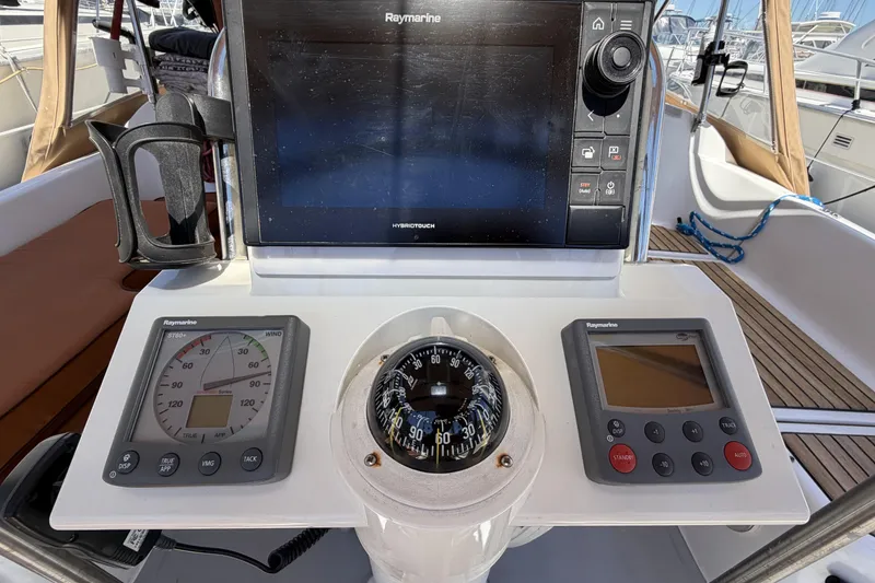 Slide: The Image of Cockpit navigation instruments on a 2010 Beneteau Oceanis 37 sailboat. - 26