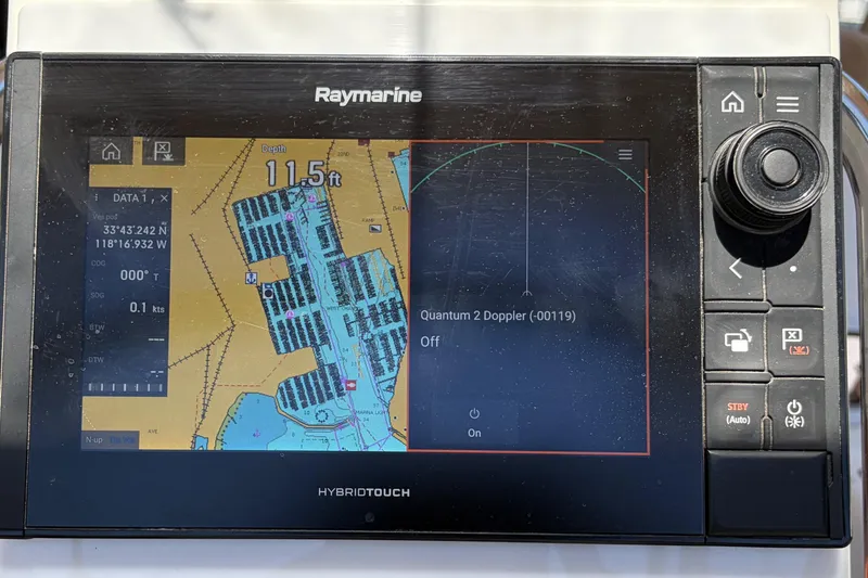 Slide: The Image of Raymarine navigation display on 2010 Beneteau Oceanis 37, showing depth and coordinates. - 28
