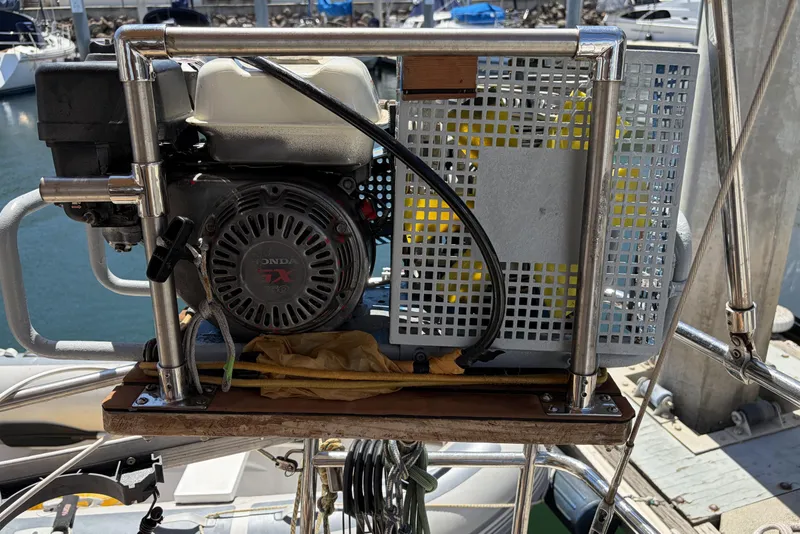 Slide: The Image of Engine mounted on a 2010 Beneteau Oceanis 37 sailboat at a marina. - 42