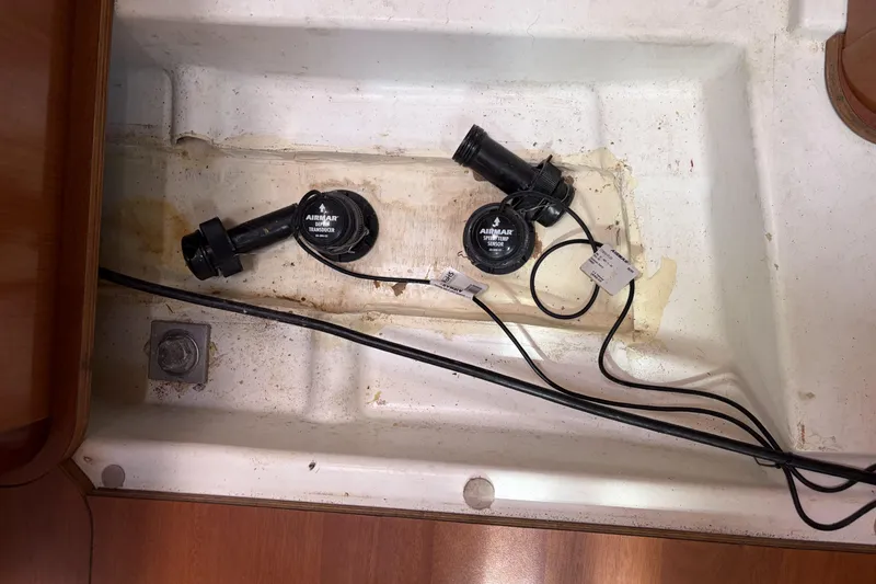 Slide: The Image of Bilge area of 2010 Beneteau Oceanis 37 with Airmar transducers and wiring. - 78