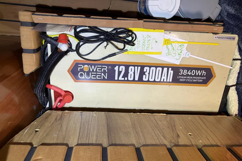 Slide: The Image of Power Queen 12.8V 300Ah lithium battery in 2010 Beneteau Oceanis 37 yacht. - 79