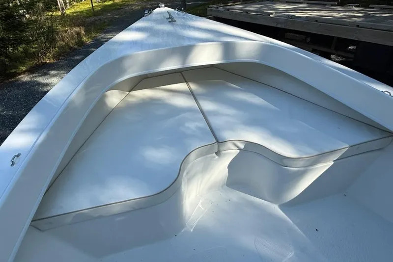 Slide: The Image of 2023 Seaway 18 Sportsman boat interior with white seating and sleek design. - 3