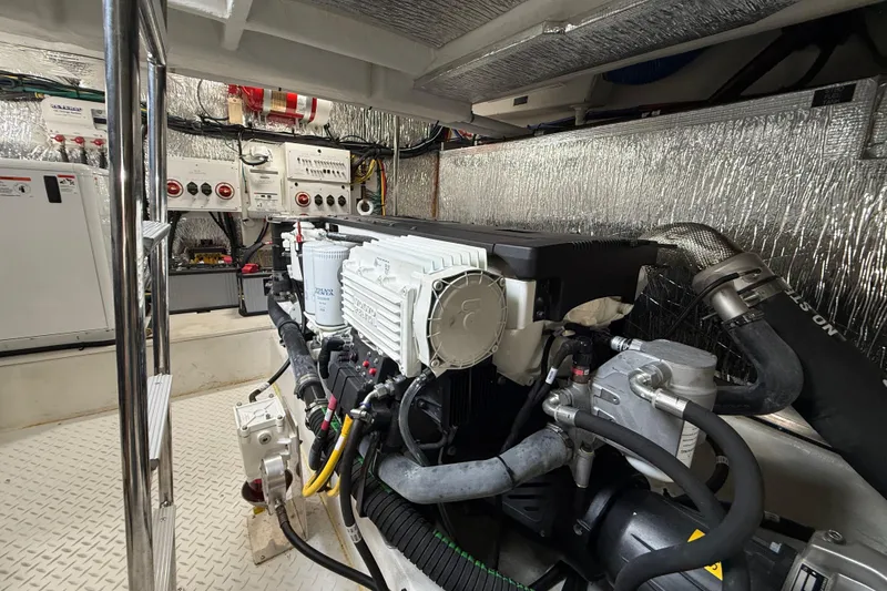 Slide: The Image of Engine room of 2023 Cruisers Yachts 42 Cantius, showcasing advanced mechanical systems. - 57