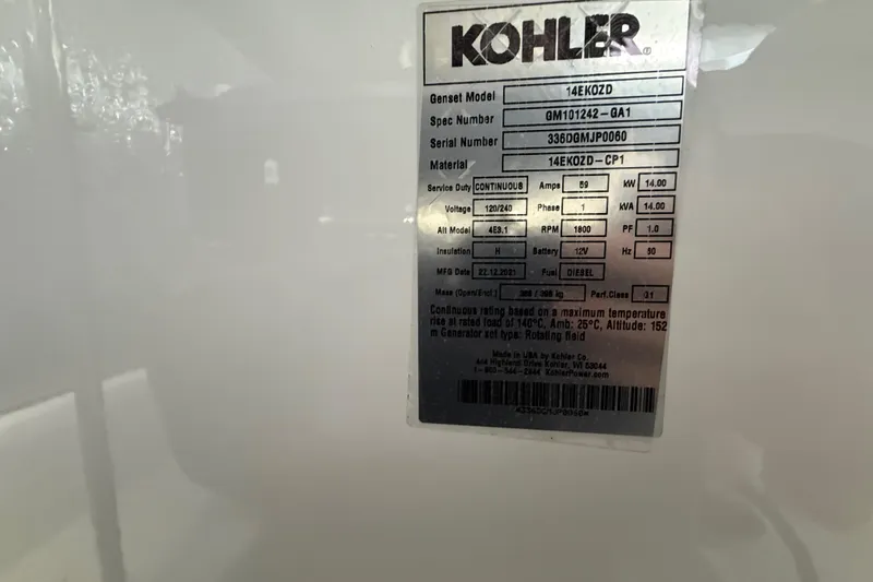 Slide: The Image of Kohler generator label on 2023 Cruisers Yachts 42 Cantius, displaying technical specifications. - 61