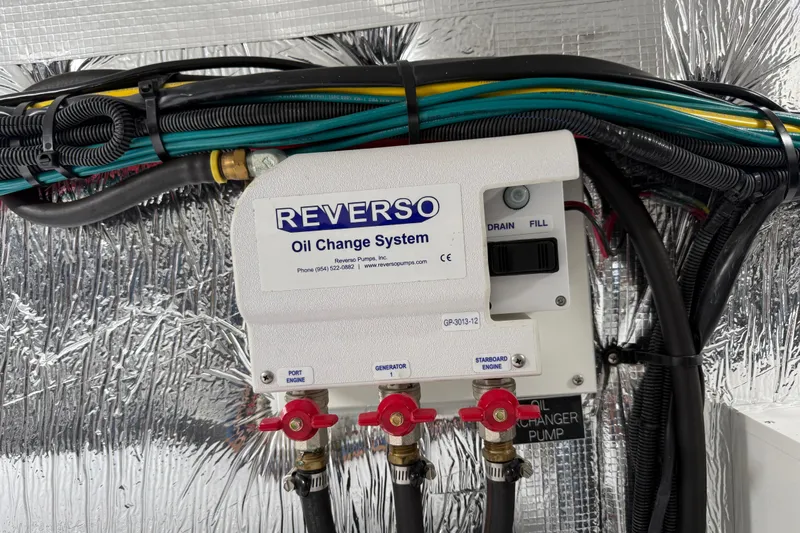 Slide: The Image of Reverso oil change system in 2023 Cruisers Yachts 42 Cantius engine room. - 65