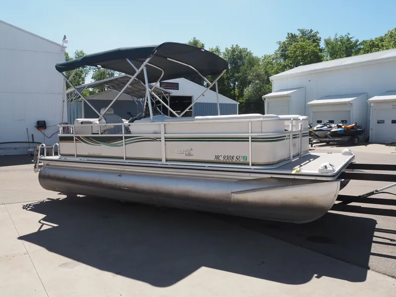 Slide: The Image of 2005 Harris Sunliner 200 pontoon boat on a trailer. - 2