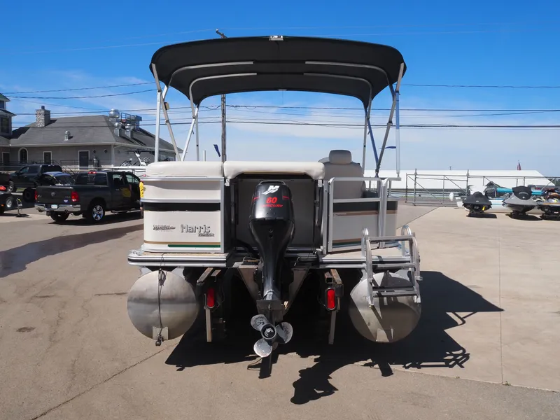 Slide: The Image of 2005 Harris Sunliner 200 pontoon boat with outboard motor. - 5
