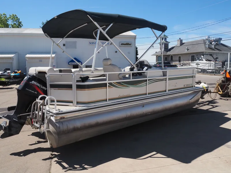 Slide: The Image of 2005 Harris Sunliner 200 pontoon boat with canopy and outboard motor. - 6