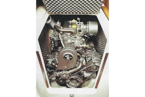 Slide: The Image of 1981 Yamaha 36 engine in a soundproof compartment, showcasing mechanical components and design. - 5