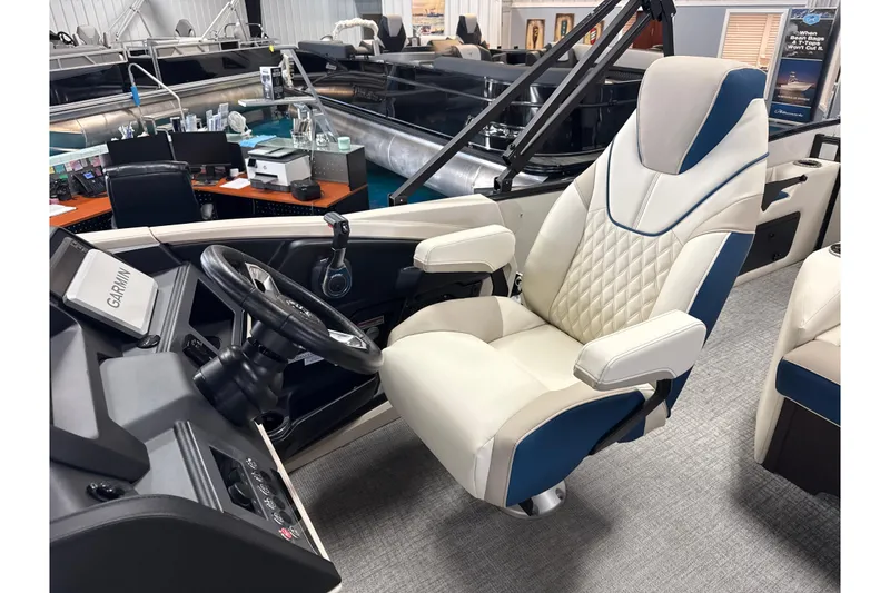 Slide: The Image of Luxurious interior of 2026 Tahoe Pontoon Cascade VRL, featuring plush captain's chair and modern controls. - 9