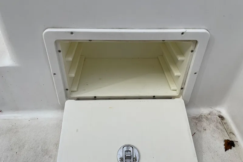 Slide: The Image of Open storage compartment on a 2008 Luhrs 28 Open boat. - 12