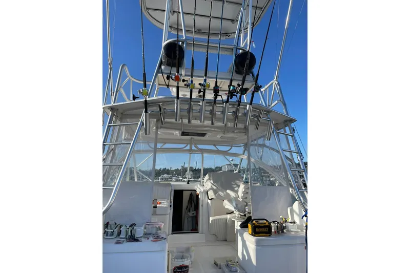Slide: The Image of 2008 Luhrs 28 Open boat with fishing rods and equipment on deck. - 2