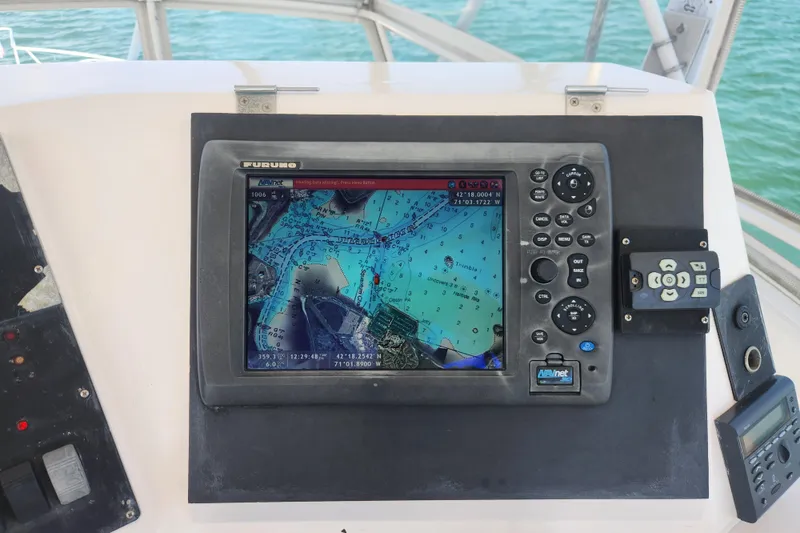 Slide: The Image of Navigation system on a 1995 Bertram 43 Convertible boat, displaying nautical charts. - 8