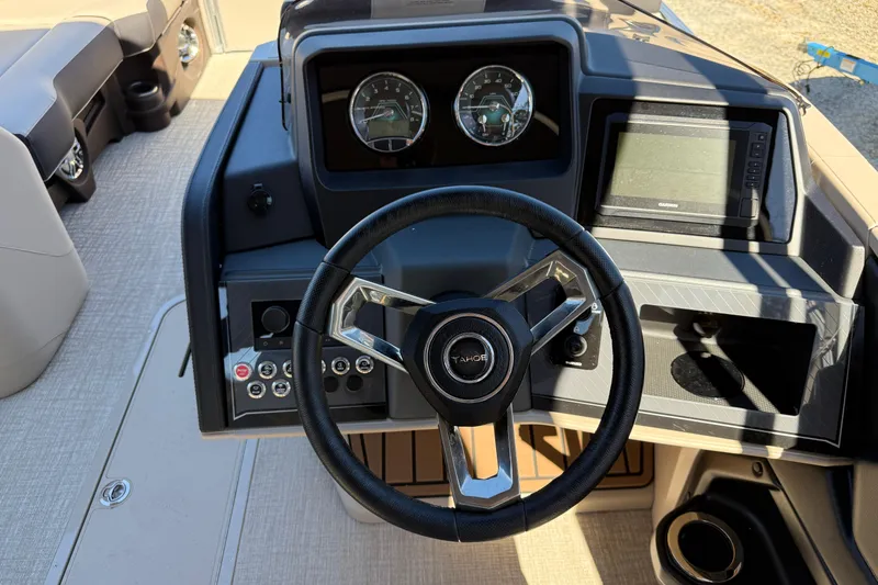 Slide: The Image of Steering console of 2026 Tahoe Pontoon Cascade Versatile Rear Bench 23 boat. - 10