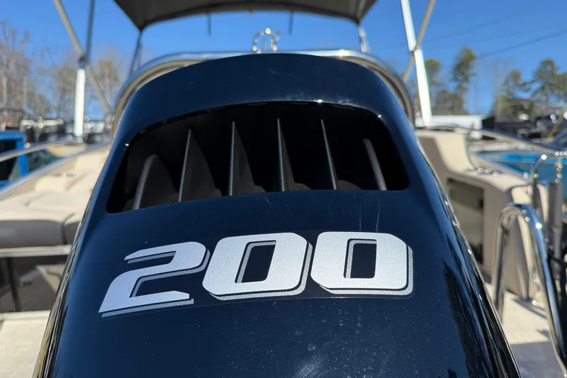 Slide: The Image of 2026 Tahoe Pontoon Cascade Versatile Rear Bench 23 with 200 horsepower engine. - 11