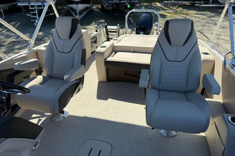 Slide: The Image of 2026 Tahoe Pontoon Cascade Versatile Rear Bench 23 interior with plush seating. - 14