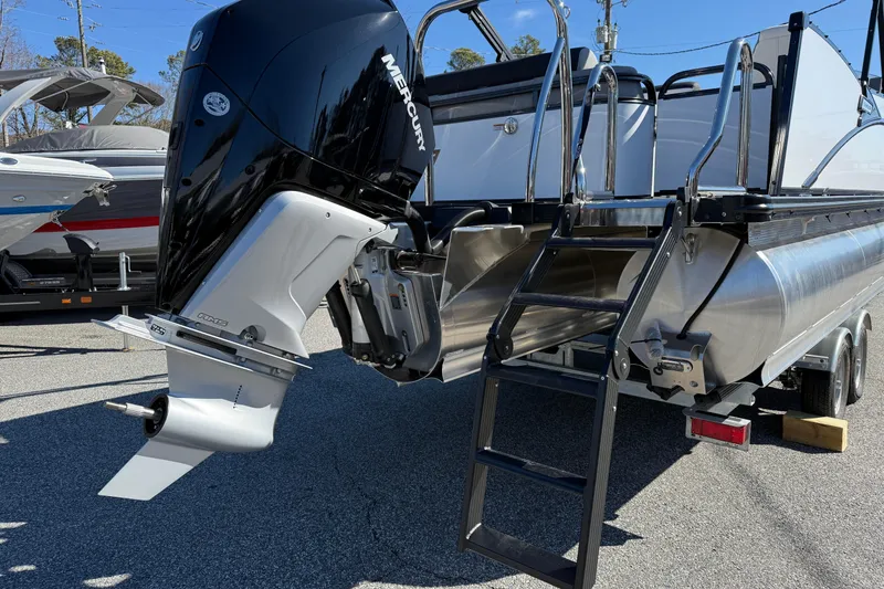 Slide: The Image of 2026 Tahoe Pontoon Cascade VRL with Mercury outboard engine and boarding ladder. - 13