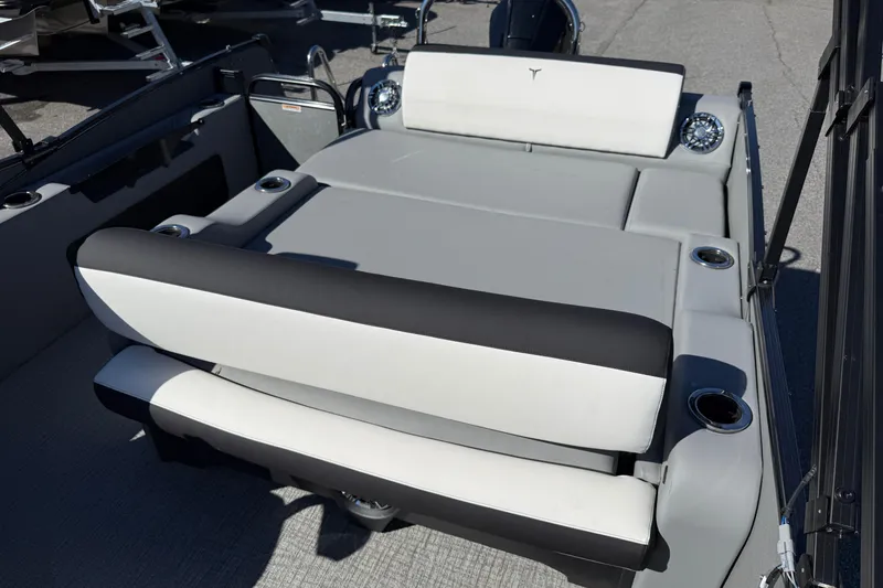 Slide: The Image of 2026 Tahoe Pontoon Cascade VRL 23' interior seating with cup holders and modern design. - 2