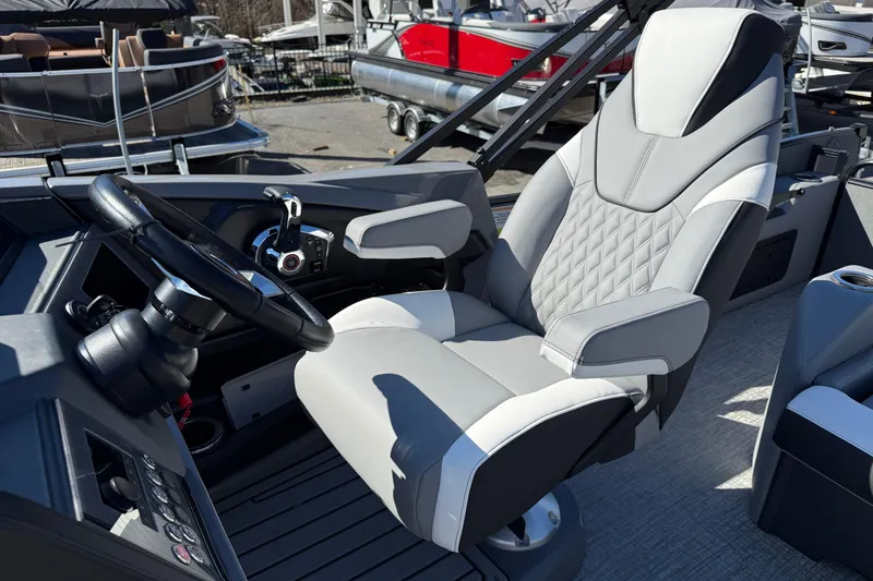 Slide: The Image of Luxurious captain's chair in 2026 Tahoe Pontoon Cascade VRL - 23' boat cockpit. - 7