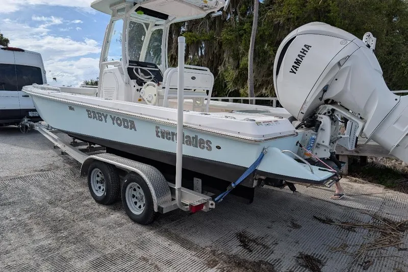 Slide: The Image of 2022 Everglades 243 Center Console boat on trailer with Yamaha engine. - 1