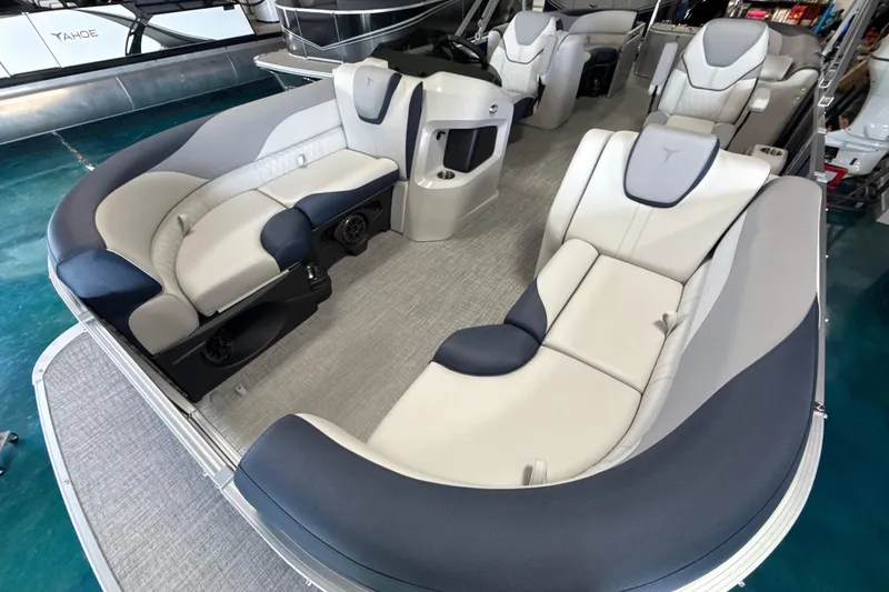 Slide: The Image of 2026 Tahoe Pontoon LTZ Quad Lounger with luxurious seating and modern design. - 7