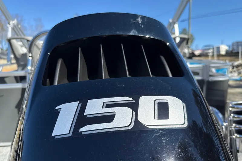 Slide: The Image of Close-up of a 150 horsepower engine on a 2026 Tahoe Pontoon Sport 85 Rear Fish. - 8
