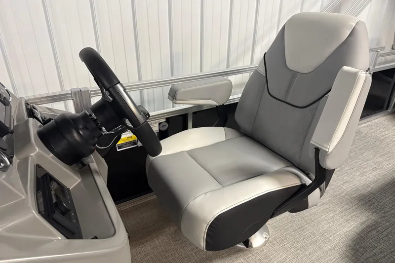 Slide: The Image of Captain's chair and steering wheel of 2026 Tahoe Pontoon Sport 85 Rear Fish boat. - 3