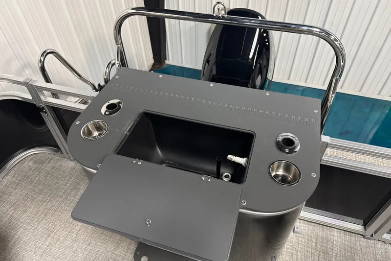 Slide: The Image of 2026 Tahoe Pontoon Sport 85 Rear Fish boat with fishing station and cup holders. - 7
