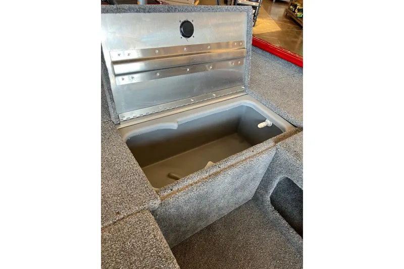 Slide: The Image of Open storage compartment in 2026 Tracker Pro 170 boat, featuring durable interior design. - 6