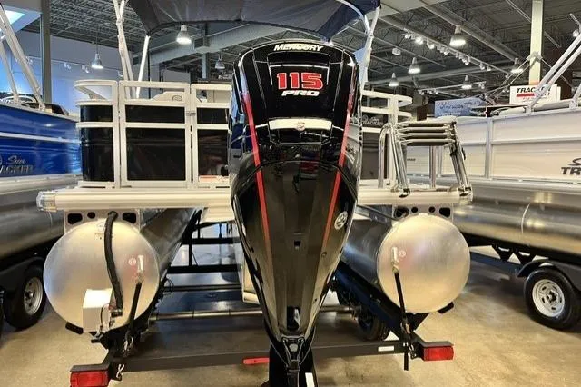 Slide: The Image of 2026 Sun Tracker SportFish 20 DLX pontoon boat with Mercury 115 Pro motor in showroom. - 98