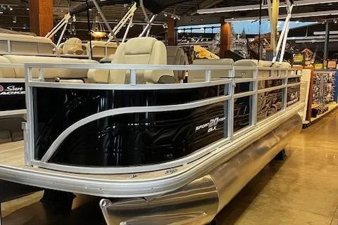 Slide: The Image of 2026 Sun Tracker SportFish 20 DLX pontoon boat displayed in a showroom. - 96