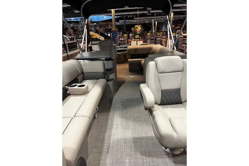 Slide: The Image of 2026 Sun Tracker SportFish 20 DLX interior with plush seating and modern design. - 100