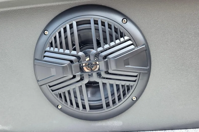 Slide: The Image of Close-up of a speaker on a 2026 Sun Tracker SportFish 20 DLX boat. - 10