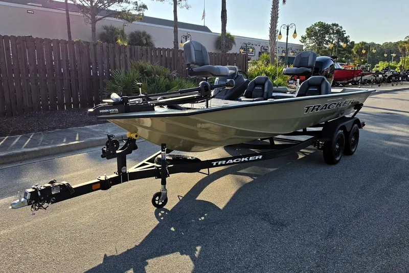 Slide: The Image of 2026 Tracker Pro Team 195 boat on trailer in outdoor setting. - 9
