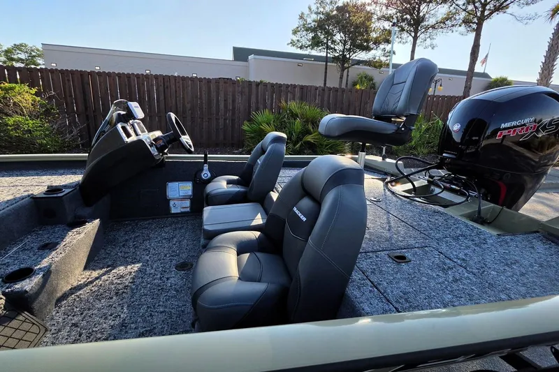 Slide: The Image of 2026 Tracker Pro Team 195 boat interior with Mercury Pro XS engine, featuring comfortable seating. - 15