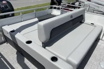 Slide: The Image of 2026 Sun Tracker Party Barge 22 RF DLX with spacious seating and cup holders. - 4