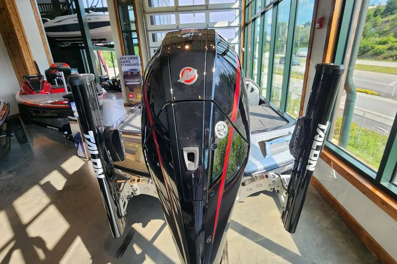 Slide: The Image of 2026 Ranger Z519R boat with Talon anchors displayed in a showroom. - 5