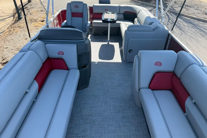 Slide: The Image of 2026 Sun Tracker Party Barge 20 DLX interior with spacious seating and modern design. - 2