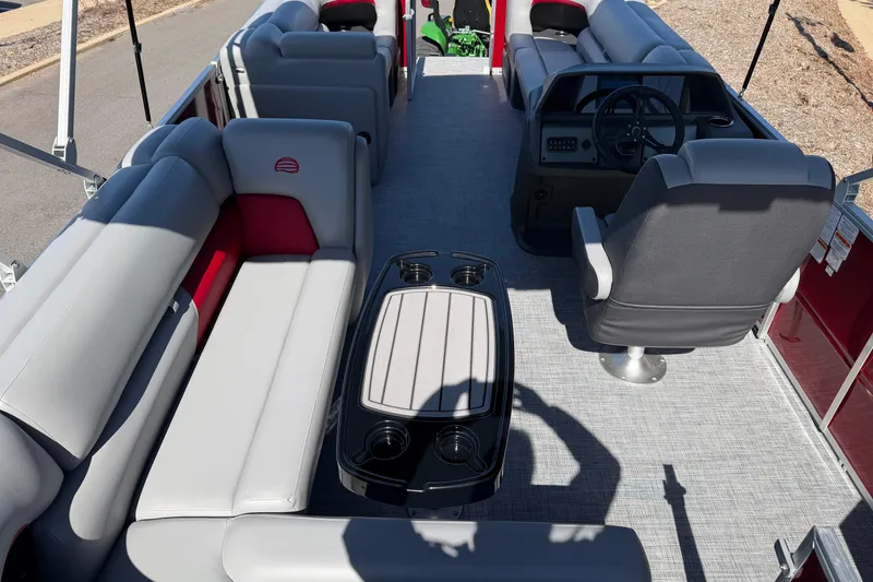 Slide: The Image of 2026 Sun Tracker Party Barge 20 DLX interior with spacious seating and modern helm. - 3